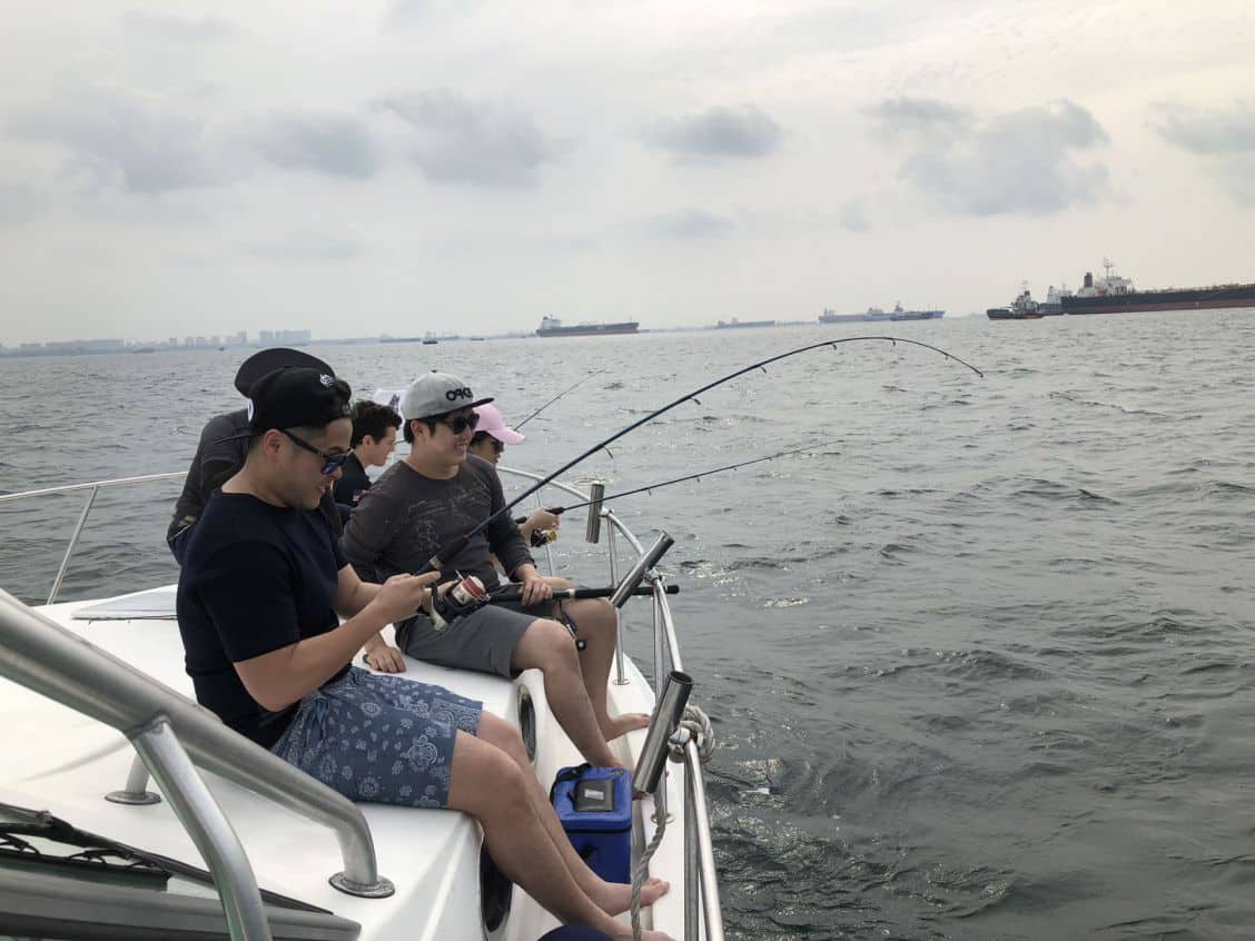Fishing with friends on yacht
