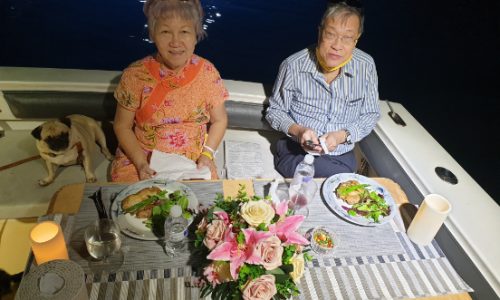 Elderly Couple Celebrating Anniversary On Yacht
