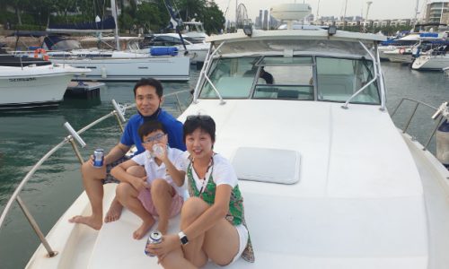 Family Celebrating Birthday Party on Yacht Singapore