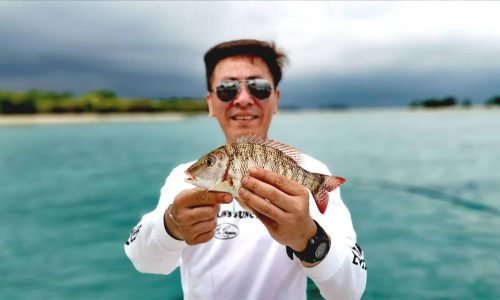 The Dad With His Emperor Snapper