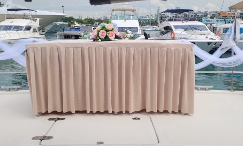 Table setup for Wedding Solemnisation. Yacht chartering with Wanderlust Adventures.